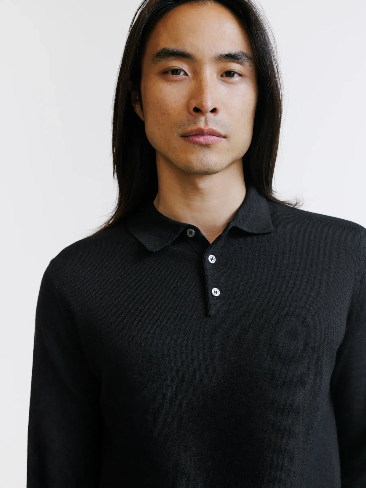 Pull col polo boutonné en laine mérinos noir - IZAC