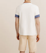 Polo boutonné à bandes pêche - IZAC